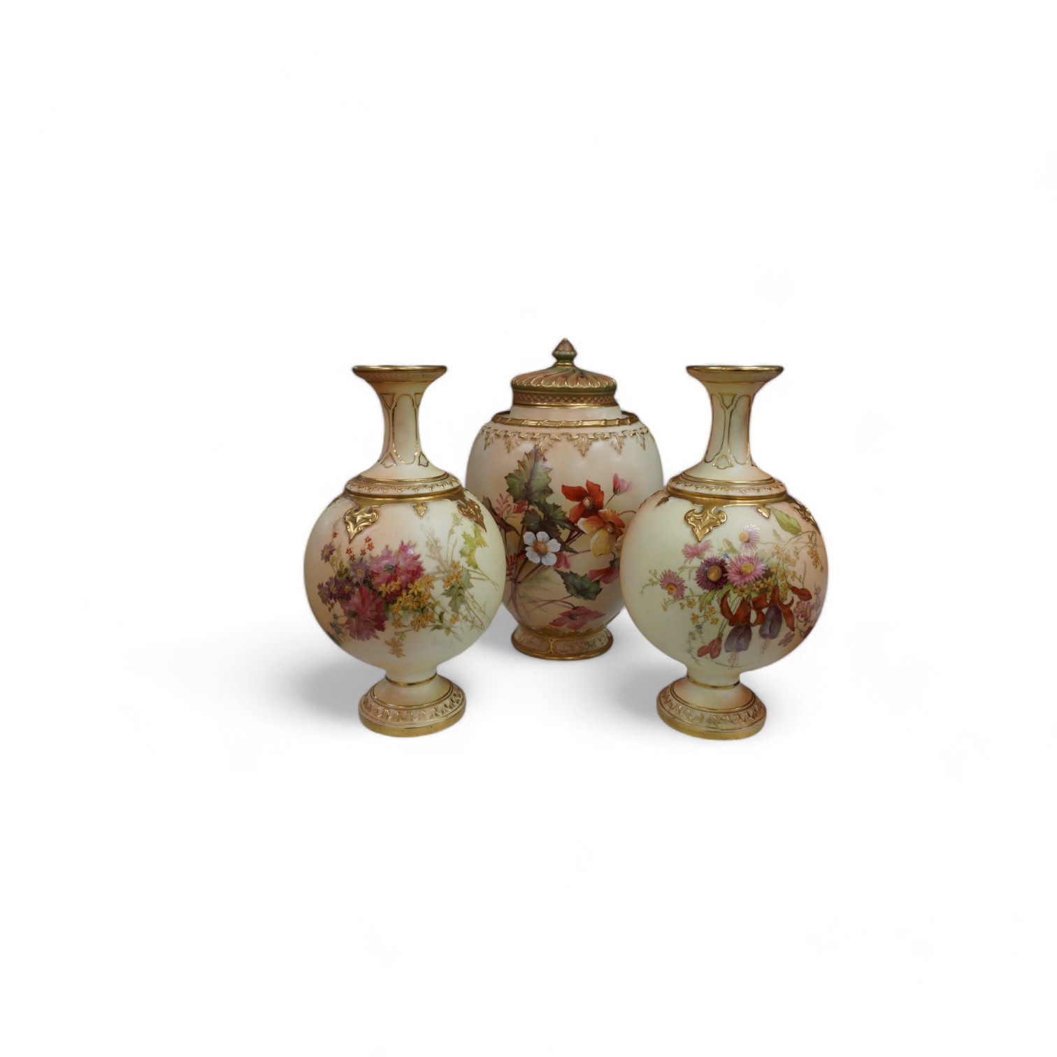 A Worcester blush ivory jar and cover, and a pair of similar vases, shape numbers 2048 and 1851, tallest 26cm. Condition - good